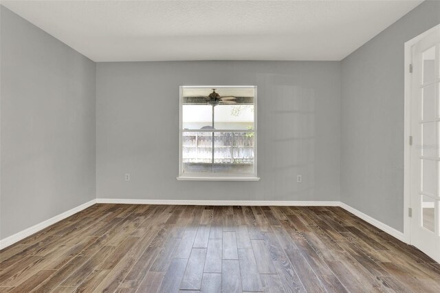 809 Deer Glen Ct, Fruitland Park, FL 34731 - empty room with wood finished floors and baseboards