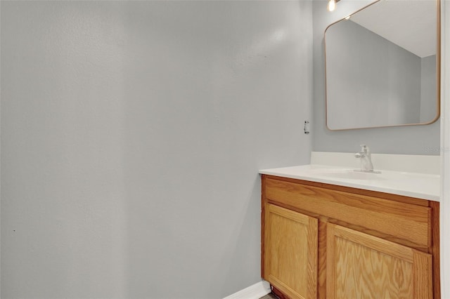 809 Deer Glen Ct, Fruitland Park, FL 34731 - bathroom featuring vanity and baseboards