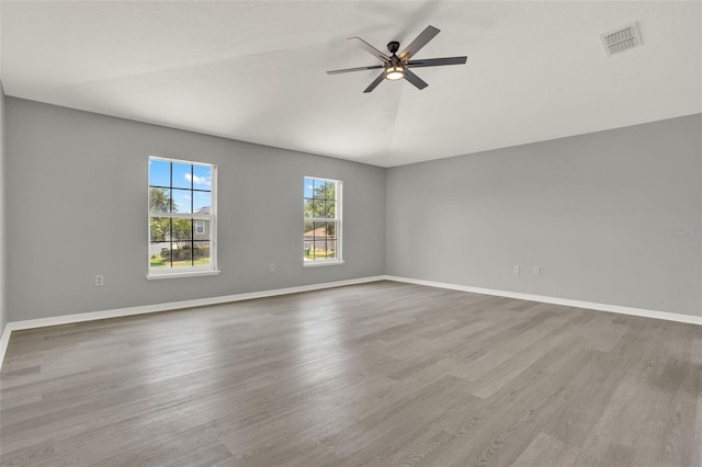 809 Deer Glen Ct, Fruitland Park, FL 34731 - spare room featuring wood finished floors, a ceiling fan, and baseboards