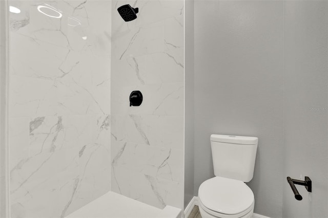 809 Deer Glen Ct, Fruitland Park, FL 34731 - bathroom with toilet, a marble finish shower, and baseboards