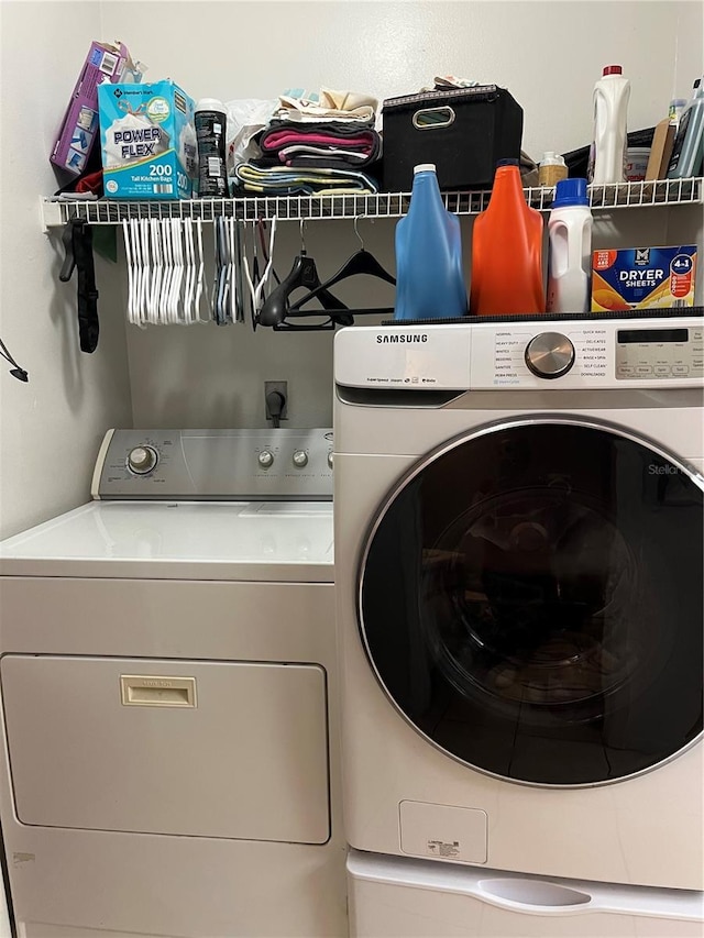 707 Carpenters Way Unit 50, Lakeland, FL 33809 - washroom featuring washing machine and clothes dryer