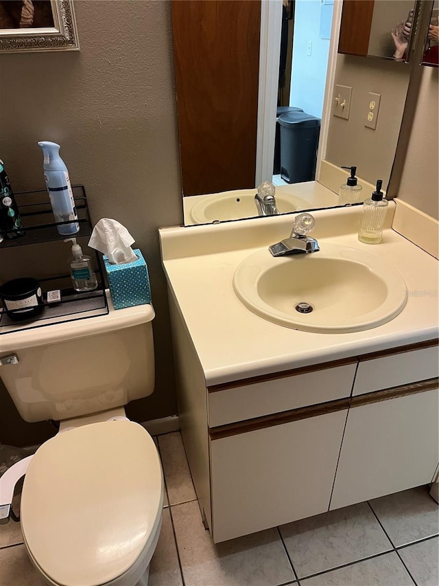 707 Carpenters Way Unit 50, Lakeland, FL 33809 - bathroom with vanity, tile patterned floors, and toilet