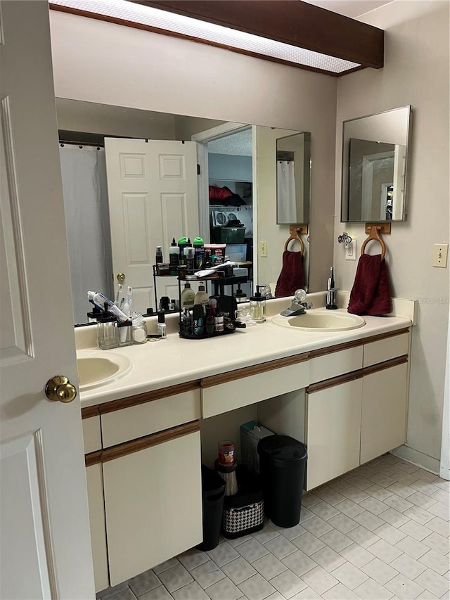 707 Carpenters Way Unit 50, Lakeland, FL 33809 - bathroom with vanity and tile patterned flooring