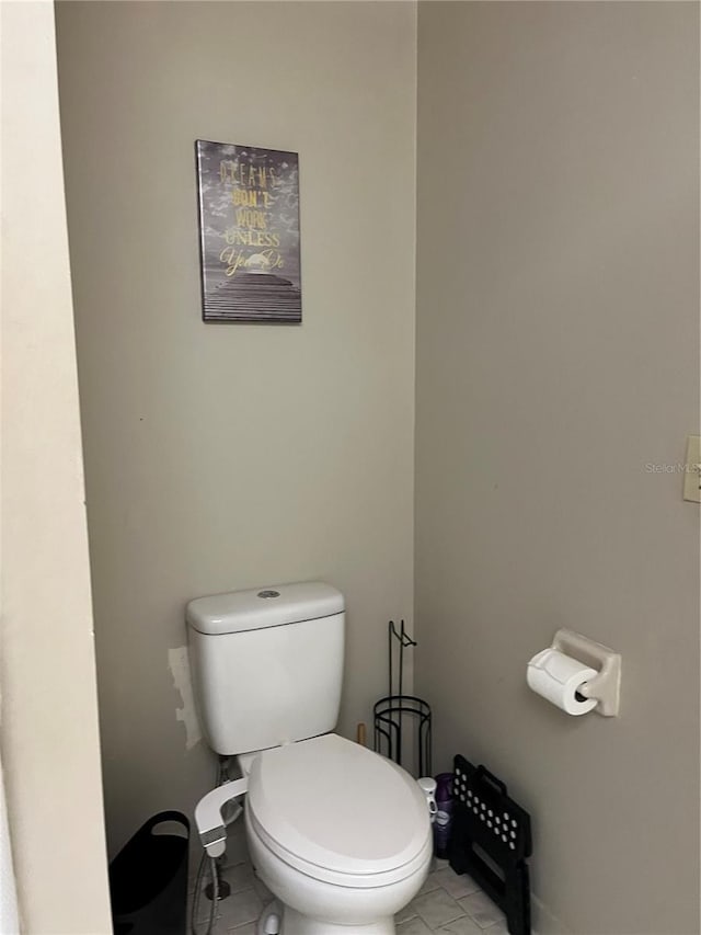 707 Carpenters Way Unit 50, Lakeland, FL 33809 - bathroom featuring tile patterned flooring and toilet