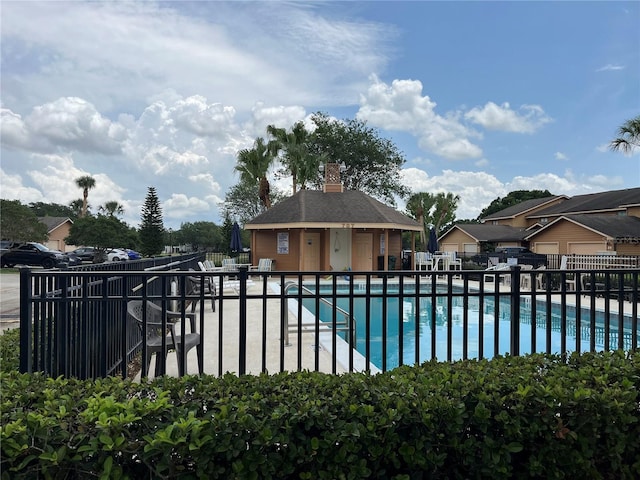 707 Carpenters Way Unit 50, Lakeland, FL 33809 - community pool featuring a patio area