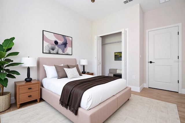 33 W 7th St, Apopka, FL 32703 - bedroom with wood finished floors and baseboards