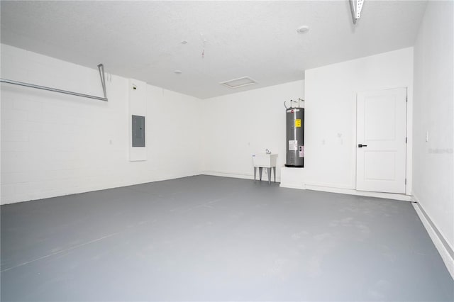 33 W 7th St, Apopka, FL 32703 - garage with electric panel and electric water heater