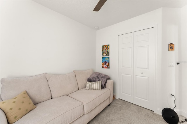 701 Dennis Ave, Orlando, FL 32807 - living area featuring light carpet, a ceiling fan, and baseboards