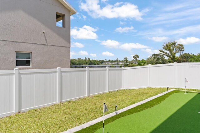 701 Dennis Ave, Orlando, FL 32807 - view of yard featuring a putting green