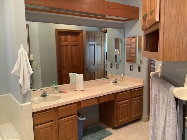 13111 Sunshine Cir, Clermont, FL 34711 - bathroom featuring tile patterned floors and double vanity
