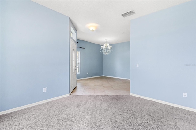 9644 Myrtle Creek Ln, Orlando, FL 32832 - carpeted spare room with a chandelier, baseboards, and tile patterned floors