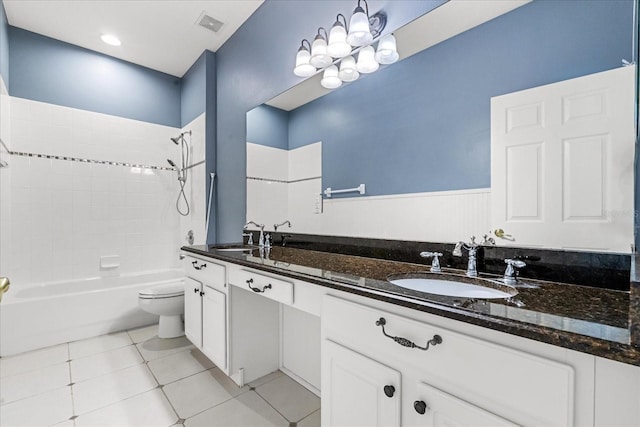 9644 Myrtle Creek Ln, Orlando, FL 32832 - bathroom with double vanity, toilet, shower / tub combination, and tile patterned floors