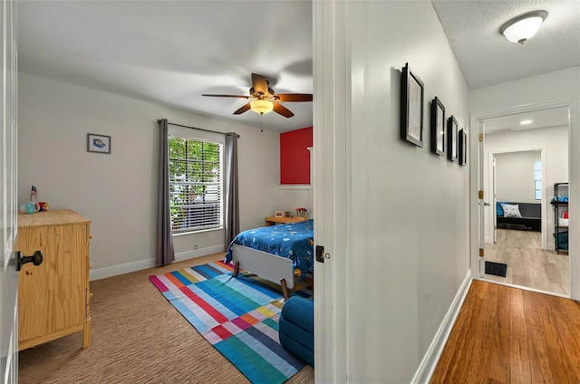 1202 Marshall Ct, Eustis, FL 32726 - bedroom featuring wood finished floors and baseboards
