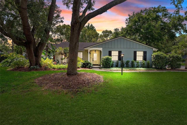 1202 Marshall Ct, Eustis, FL 32726 - ranch-style house with a lawn