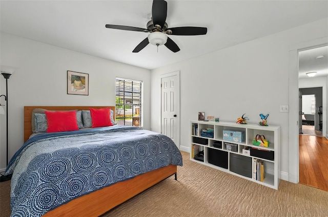 1202 Marshall Ct, Eustis, FL 32726 - carpeted bedroom with baseboards and a ceiling fan