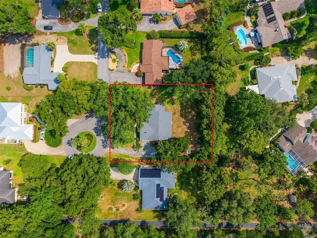 1202 Marshall Ct, Eustis, FL 32726 - aerial perspective of suburban area with a pool and property boundaries highlighted