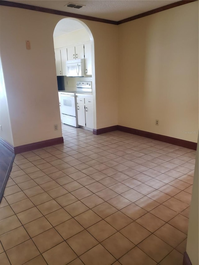 706 Lighthouse Ct, Altamonte Springs, FL 32714 - empty room with crown molding, arched walkways, and baseboards
