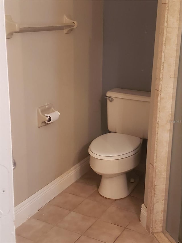 706 Lighthouse Ct, Altamonte Springs, FL 32714 - bathroom featuring toilet, tile patterned floors, and baseboards