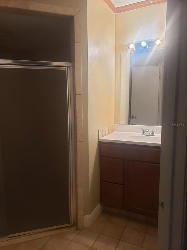 706 Lighthouse Ct, Altamonte Springs, FL 32714 - full bathroom featuring tile patterned floors, vanity, a shower stall, and baseboards
