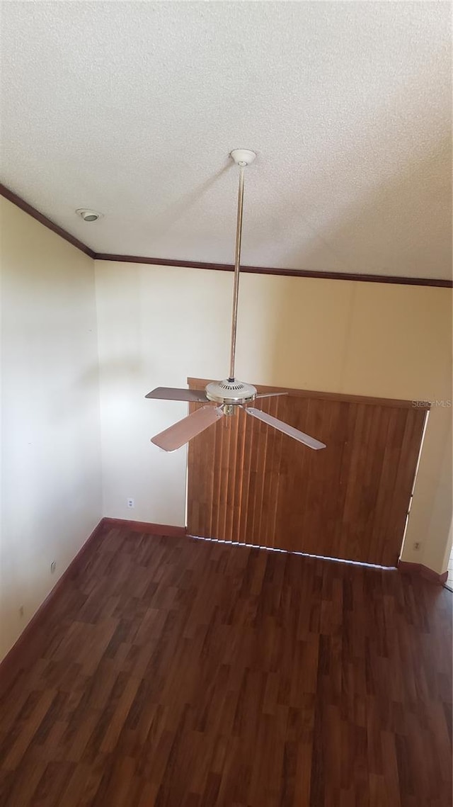 706 Lighthouse Ct, Altamonte Springs, FL 32714 - empty room with wood finished floors, crown molding, a ceiling fan, a textured ceiling, and baseboards