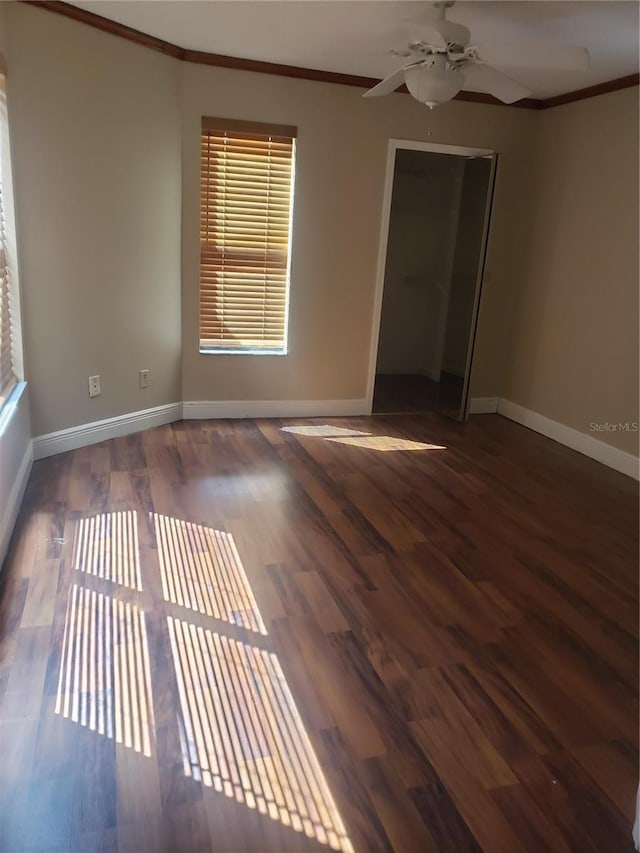 706 Lighthouse Ct, Altamonte Springs, FL 32714 - unfurnished room with crown molding, baseboards, a ceiling fan, and wood finished floors