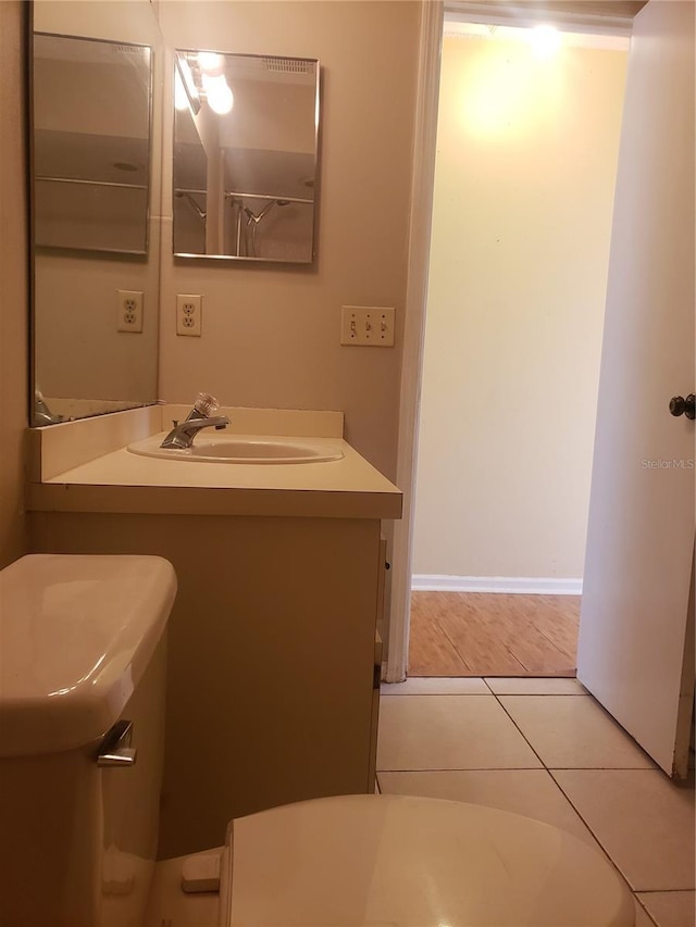 706 Lighthouse Ct, Altamonte Springs, FL 32714 - bathroom with vanity, tile patterned floors, and toilet