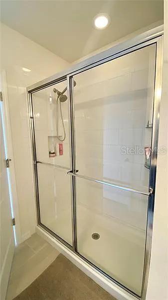 16391 Admirals Cove Ln, Winter Garden, FL 34787 - full bathroom with a stall shower and recessed lighting