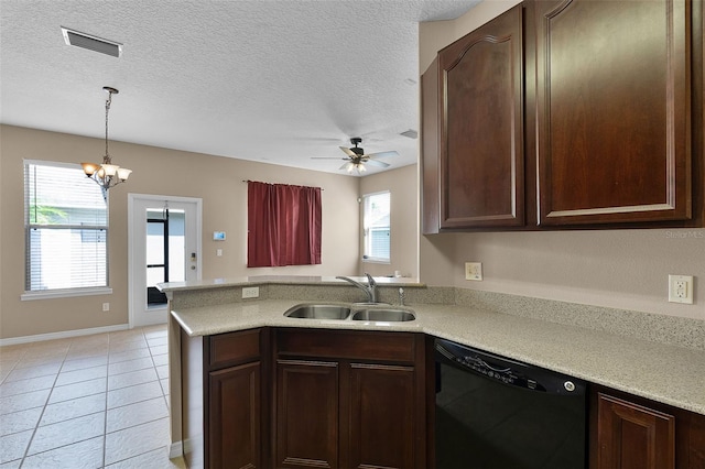 12335 Cruxbury Dr, Windermere, FL 34786 - kitchen featuring dishwasher, plenty of natural light, light countertops, and a textured ceiling