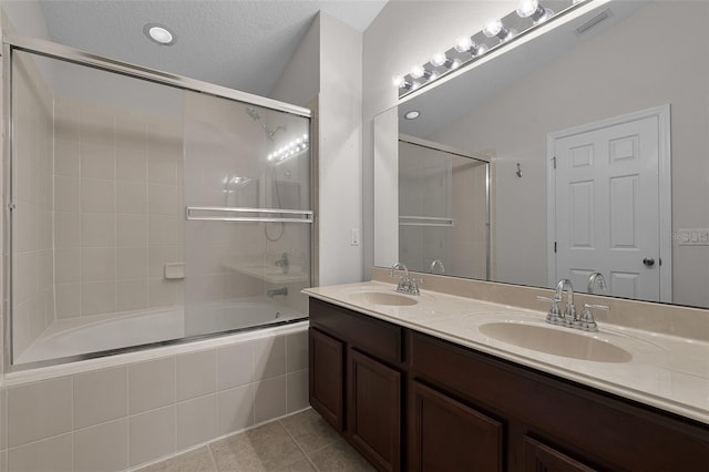 12335 Cruxbury Dr, Windermere, FL 34786 - full bath with tiled shower / bath, double vanity, and tile patterned flooring