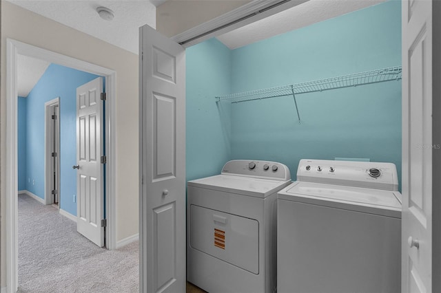 12335 Cruxbury Dr, Windermere, FL 34786 - laundry area featuring light colored carpet and independent washer and dryer