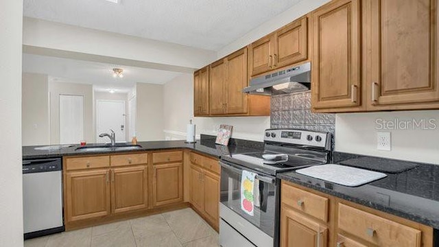 648 Kenwick Cir Unit 102, Casselberry, FL 32707 - kitchen featuring stainless steel electric stove, dishwashing machine, a sink, under cabinet range hood, and light tile patterned flooring