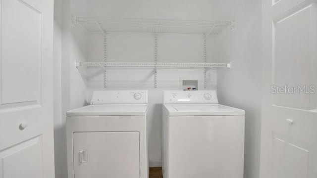 648 Kenwick Cir Unit 102, Casselberry, FL 32707 - laundry area with separate washer and dryer