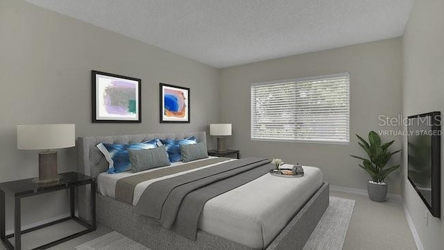 648 Kenwick Cir Unit 102, Casselberry, FL 32707 - carpeted bedroom featuring baseboards and a textured ceiling