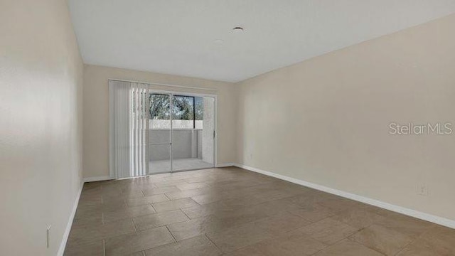 648 Kenwick Cir Unit 102, Casselberry, FL 32707 - unfurnished room featuring baseboards