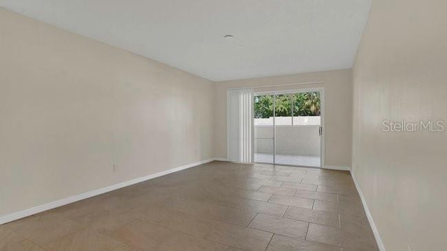 648 Kenwick Cir Unit 102, Casselberry, FL 32707 - unfurnished room with baseboards