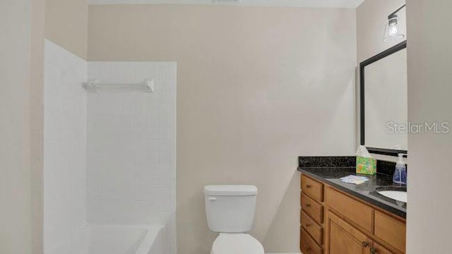 648 Kenwick Cir Unit 102, Casselberry, FL 32707 - full bath featuring toilet, vanity, and washtub / shower combination