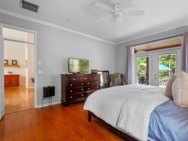 3518 Edlingham Ct, Belle Isle, FL 32812 - bedroom featuring access to exterior, wood finished floors, ornamental molding, french doors, and baseboards