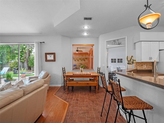 3518 Edlingham Ct, Belle Isle, FL 32812 - dining area with baseboards and recessed lighting