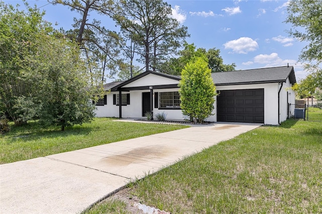 82 Fleetwood Dr, Palm Coast, FL 32137 - ranch-style house with concrete driveway, an attached garage, stucco siding, and central AC