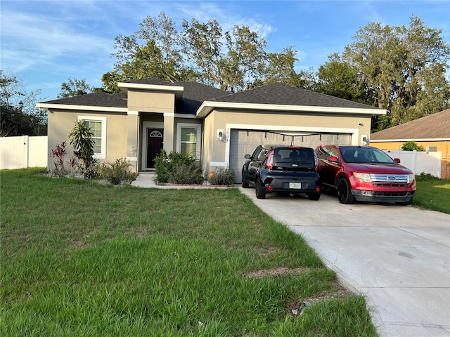 1884 Snapper Dr, Kissimmee, FL 34759 - single story home with a garage, driveway, and stucco siding