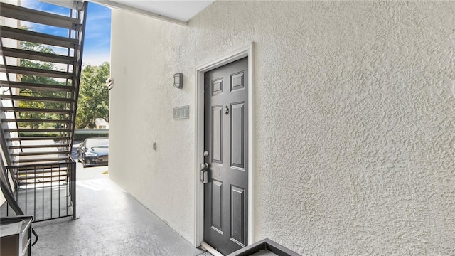 2627 Maitland Crossing Way Unit 101, Orlando, FL 32810 - view of exterior entry with stucco siding