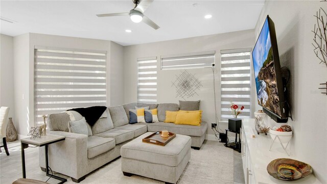 2627 Maitland Crossing Way Unit 101, Orlando, FL 32810 - living room featuring a ceiling fan and recessed lighting
