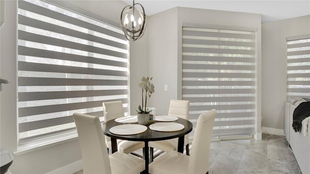 2627 Maitland Crossing Way Unit 101, Orlando, FL 32810 - dining area with a chandelier
