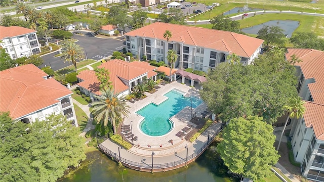 2627 Maitland Crossing Way Unit 101, Orlando, FL 32810 - drone / aerial view of a pool area and a nearby body of water
