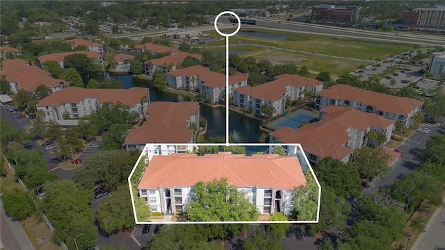 2627 Maitland Crossing Way Unit 101, Orlando, FL 32810 - aerial overview of property's location with a large body of water and property parcel outlined