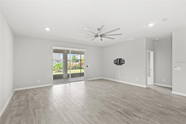 5641 Oak Knoll Dr, Saint Cloud, FL 34771 - empty room with a ceiling fan, light wood finished floors, baseboards, and recessed lighting