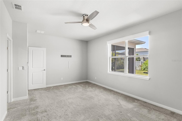 5641 Oak Knoll Dr, Saint Cloud, FL 34771 - carpeted empty room with ceiling fan and baseboards