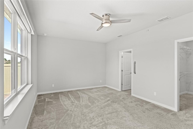 5641 Oak Knoll Dr, Saint Cloud, FL 34771 - unfurnished room with carpet flooring, ceiling fan, and baseboards