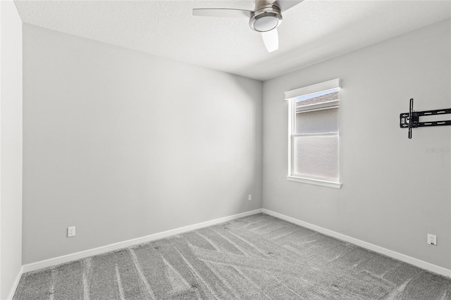 5641 Oak Knoll Dr, Saint Cloud, FL 34771 - unfurnished room featuring a ceiling fan, carpet, and baseboards