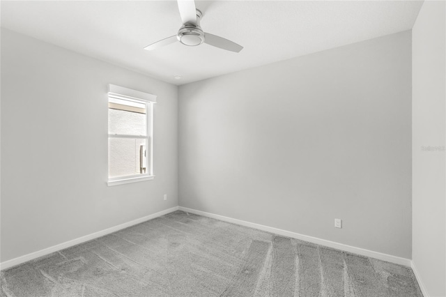 5641 Oak Knoll Dr, Saint Cloud, FL 34771 - carpeted spare room featuring a ceiling fan and baseboards